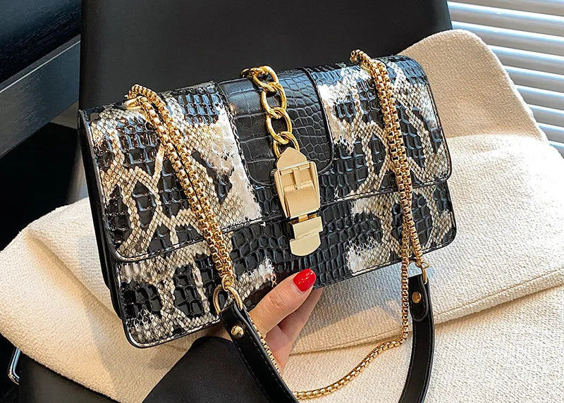 Luxury women's shoulder bag with a modern and elegant design.